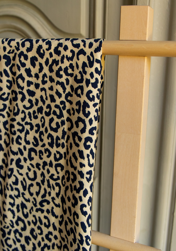 black and beige leopard print fabric
