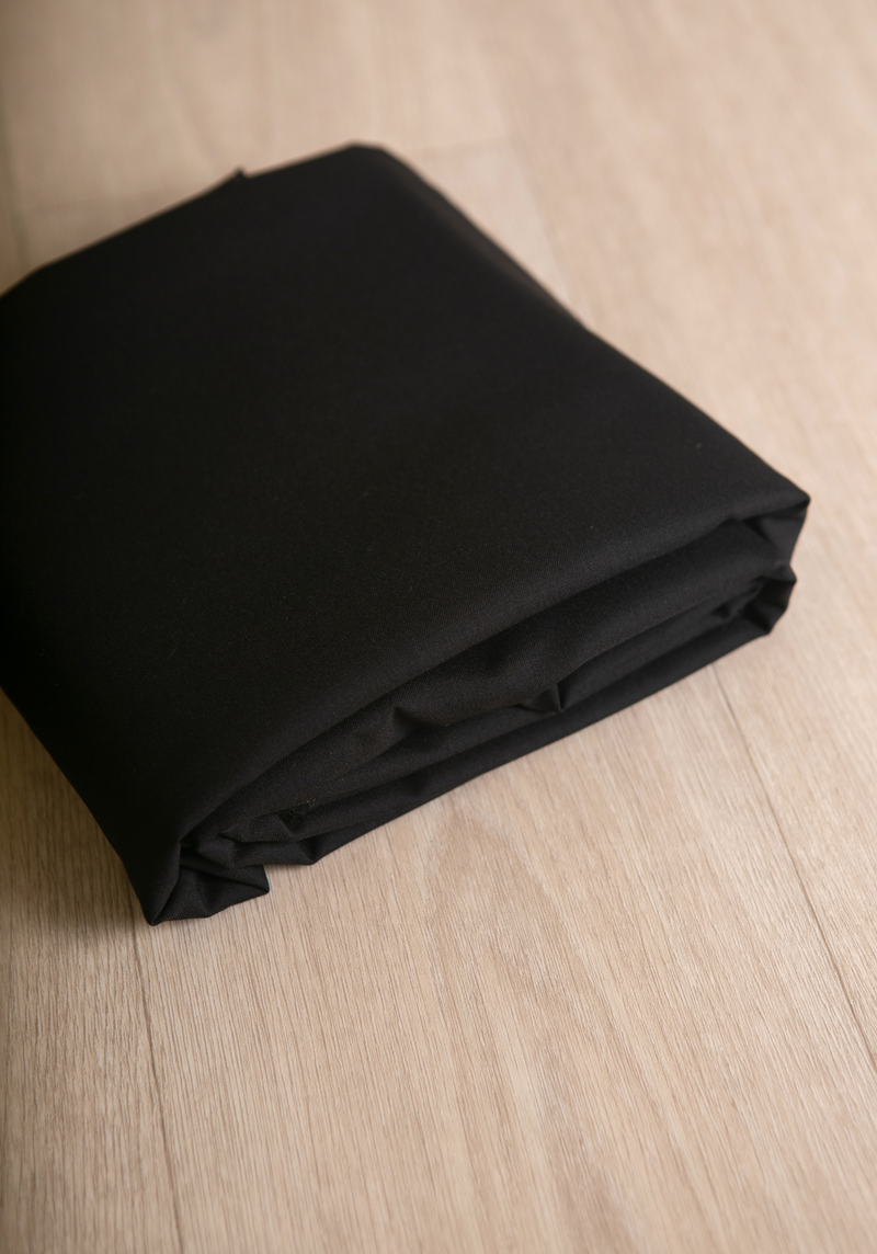 Black woollen suiting fabric - by 10 cm